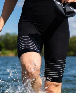 Pinnacle Swimskin 2024 - Women's 12 Pinnacle Swimskin 2024 - Women's -Athlete Outfit PinnacleSwimSkin2024 ProductImagery W Lifestlye2