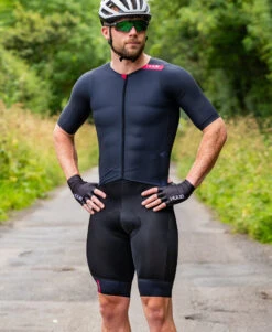 Strada Aero Road Speed Suit -Athlete Outfit Strada Road Aero Speed Suit Ribbed Sleeve Lifestyle 3 Studio